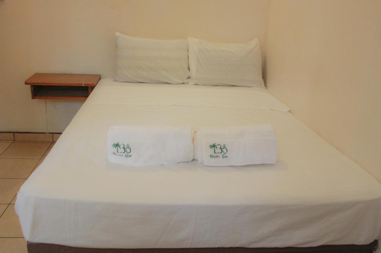 Hotel Om Downtown Санта-Крус-Хуатулко Экстерьер фото