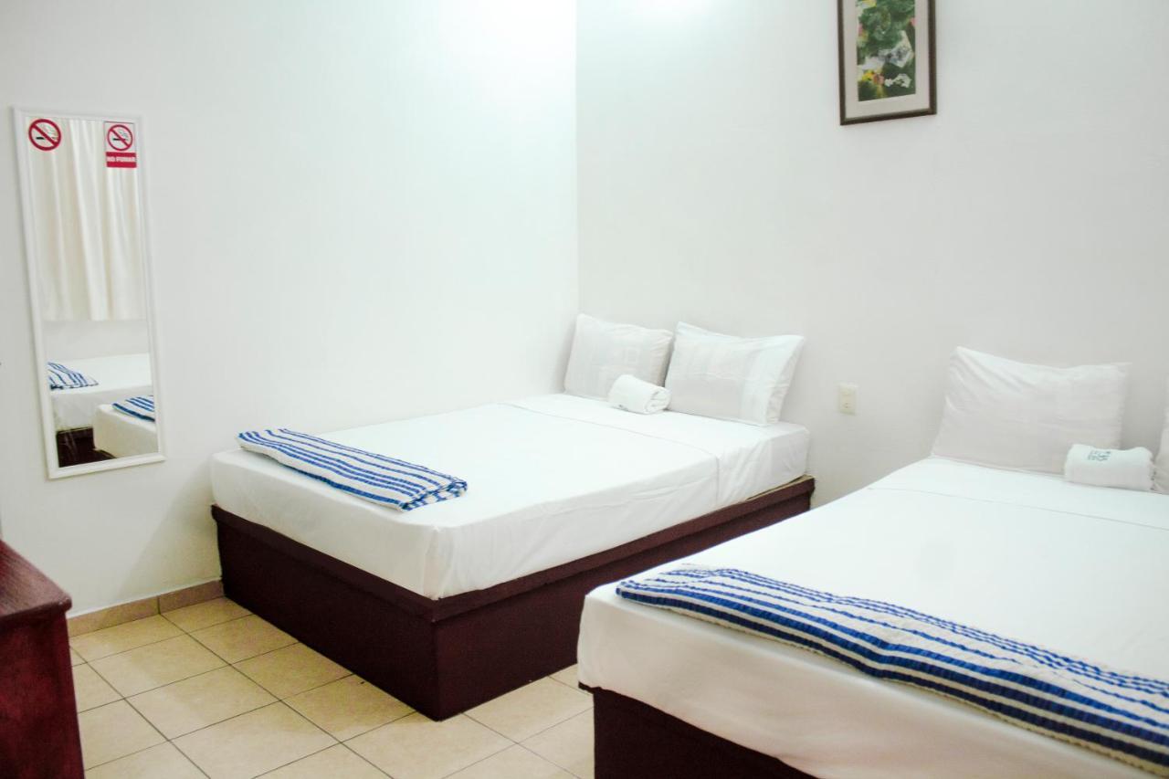 Hotel Om Downtown Санта-Крус-Хуатулко Экстерьер фото